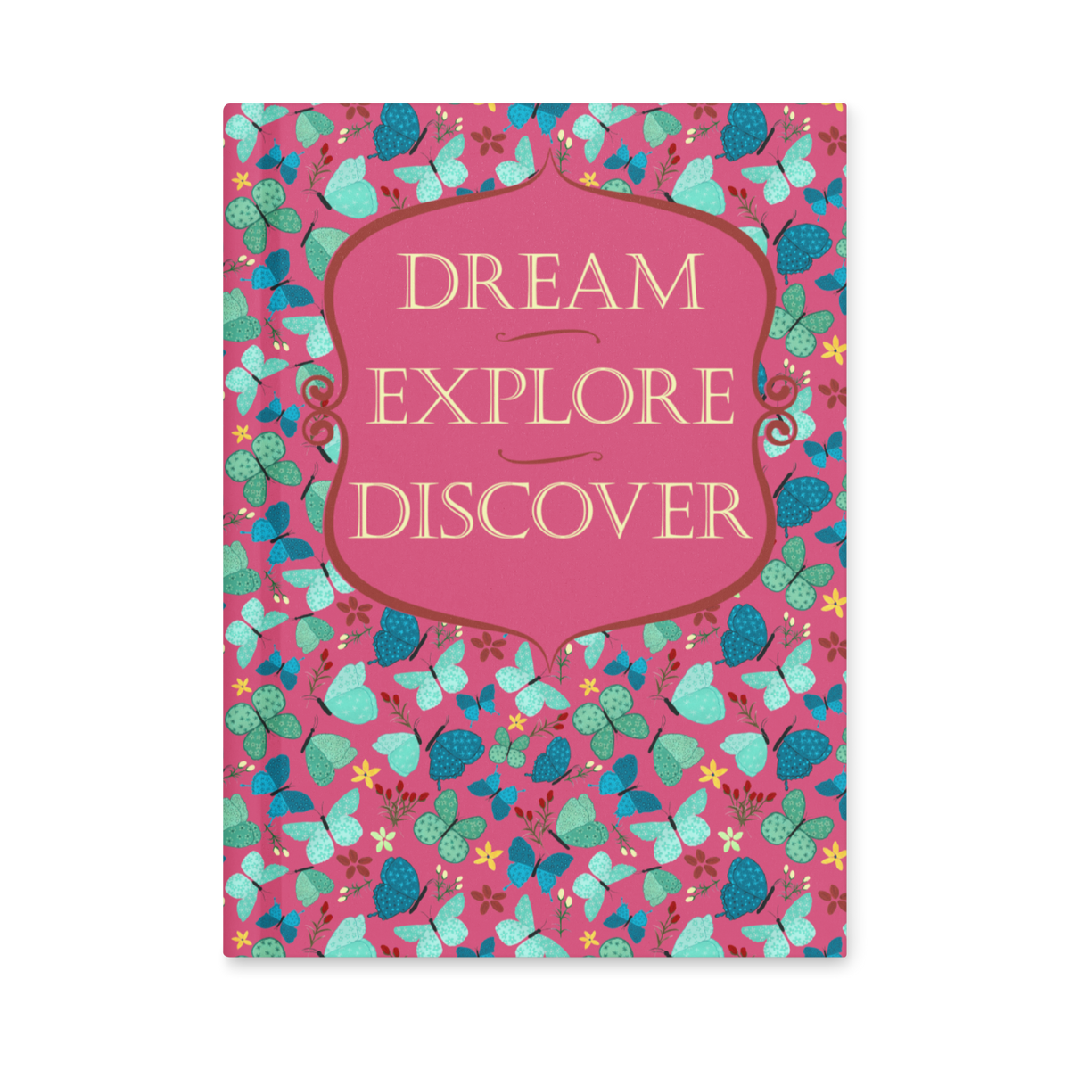 Front cover of red hardcover journal reading Dream, Explore, Discover, surrounded by teal, green and navy butterflies