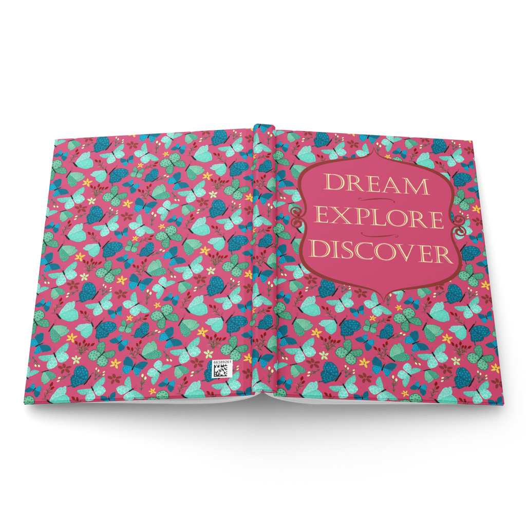 Red butterfly pattern hardcover journal lying flat to show its lined pages