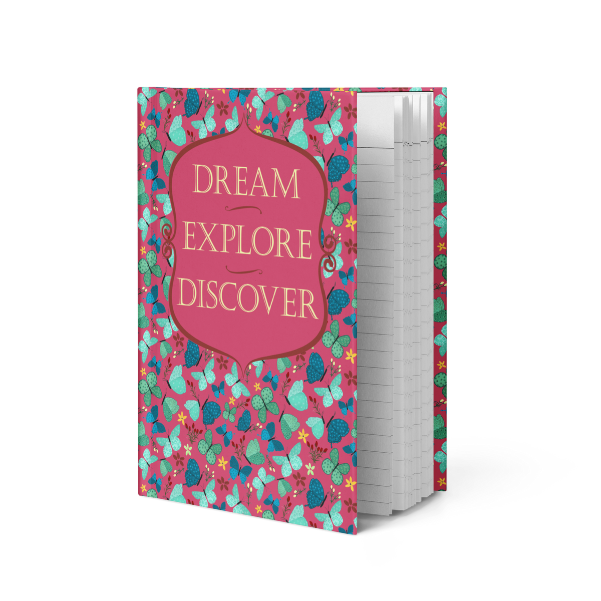 Open red Dream, Explore, Discover hardcover journal with a teal, green and navy butterfly pattern cover and lined pages